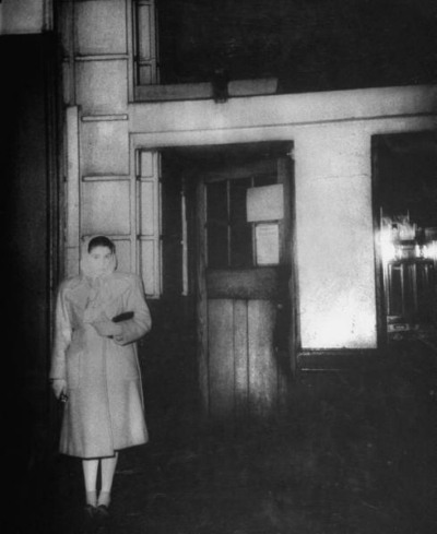 17-19 Great Windmill Street 1944 February - Girl waiting outside the stagedoor of Windmill Theatre for a friend.jpg. Click on the picture to enlarge